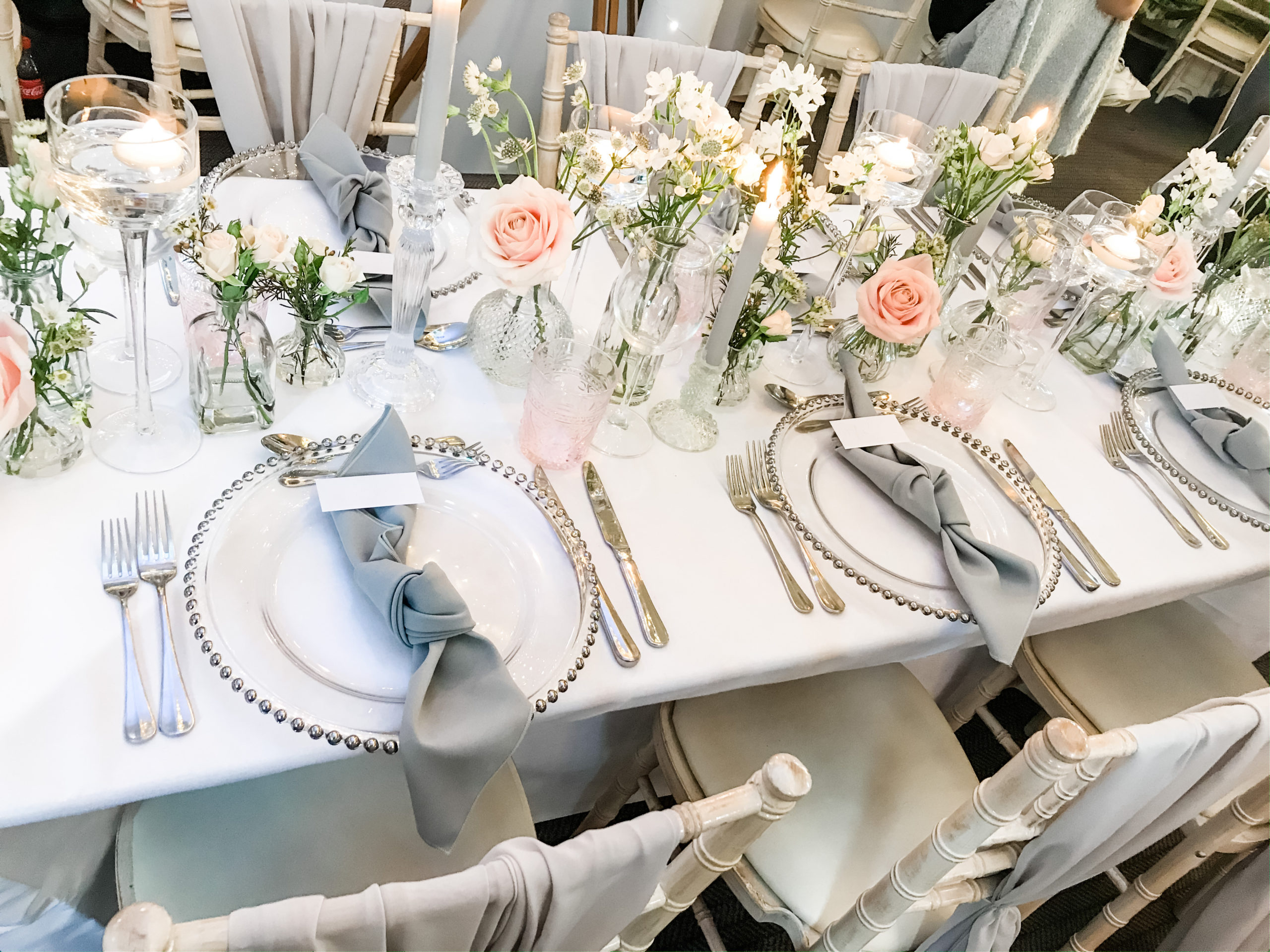 Partner with Landmark Event Rentals to enhance your event venue's offerings. We supply top-tier furnishings, lighting, and décor that elevate any space. Whether your venue hosts weddings, corporate events, or social gatherings, our rental services ensure your clients have everything they need to create stunning events.  Home Mobile Charger Plate Place Setting Grey Napkins Ambience Buckinghamshire scaled 1